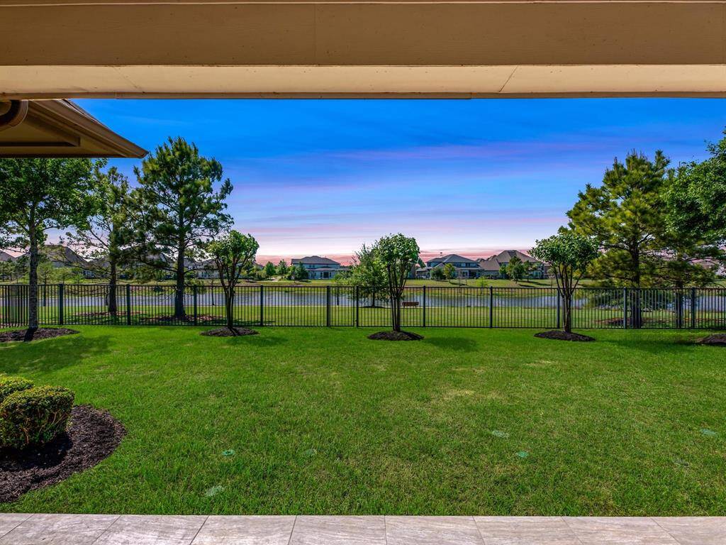 large backyard with view of lake.