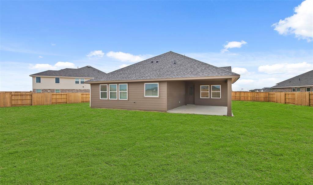 Huge backyard with a covered patio