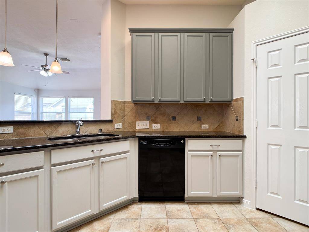 beautiful backsplash & painted cabinets with refreshing colors