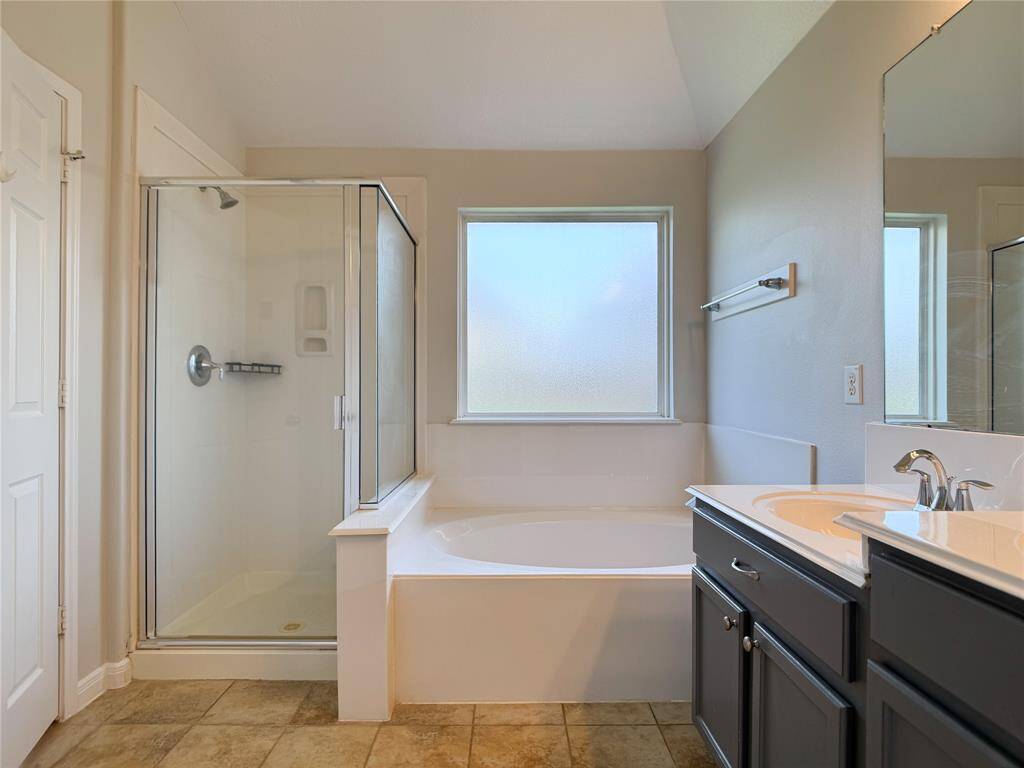 relaxing primary bath retreat: garden tub & separate shower