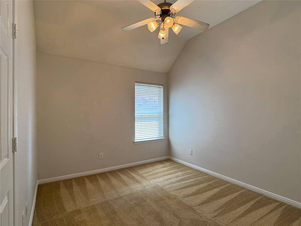 1 of 2 secondary bedrooms w/vaulted ceiling, ceiling fan