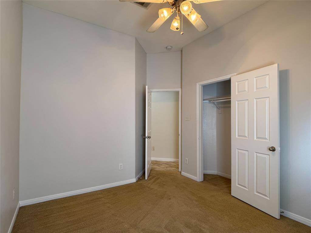 reverse view of bedroom & closet