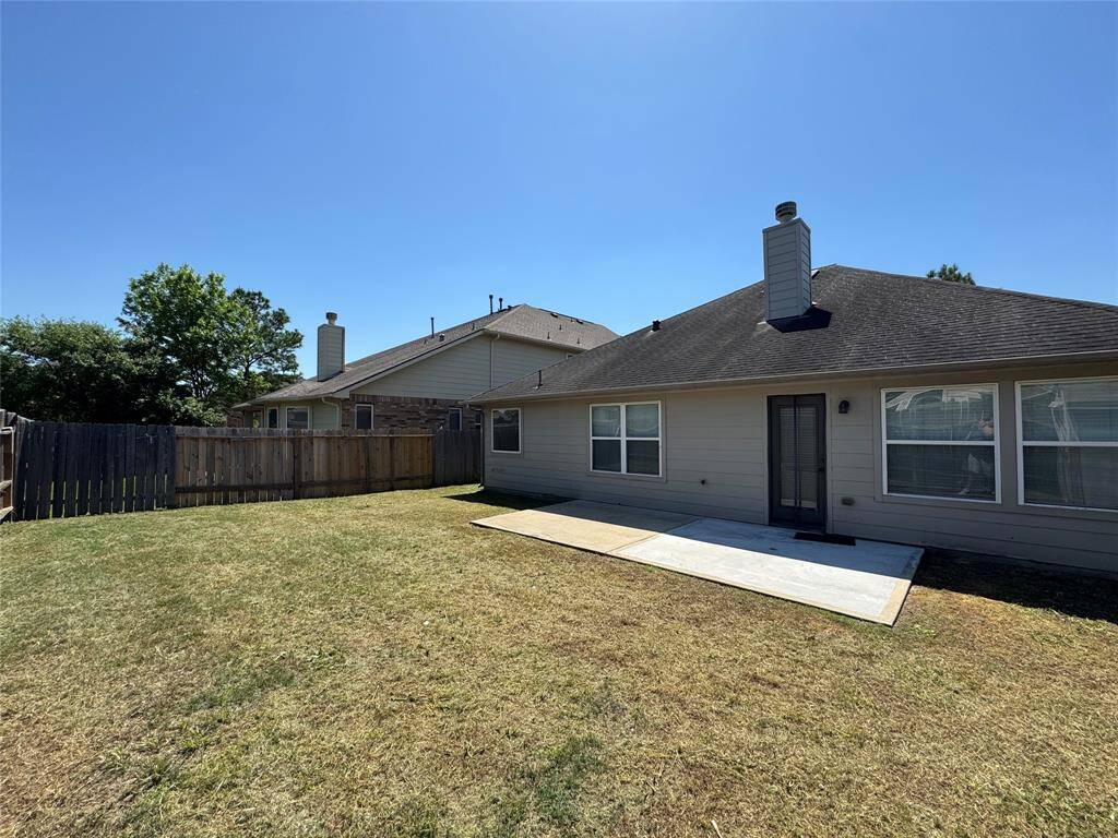 backyard with extended concrete patio