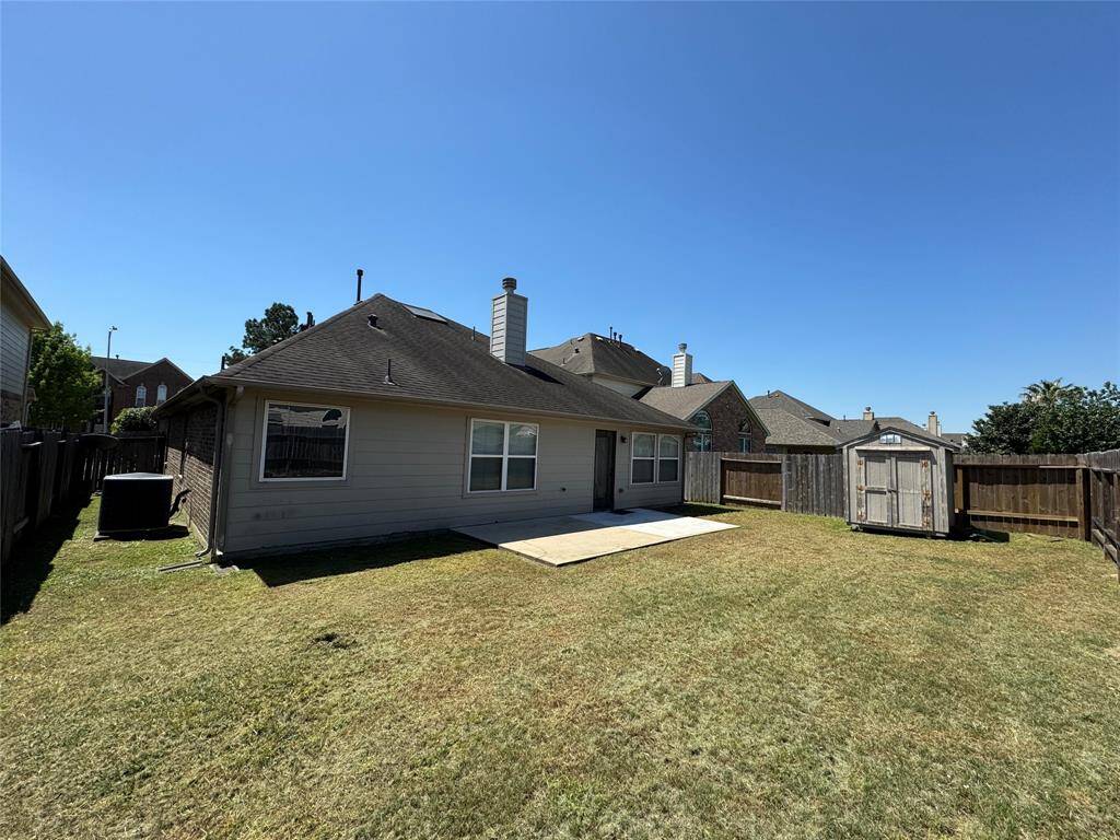huge backyard with storage shed