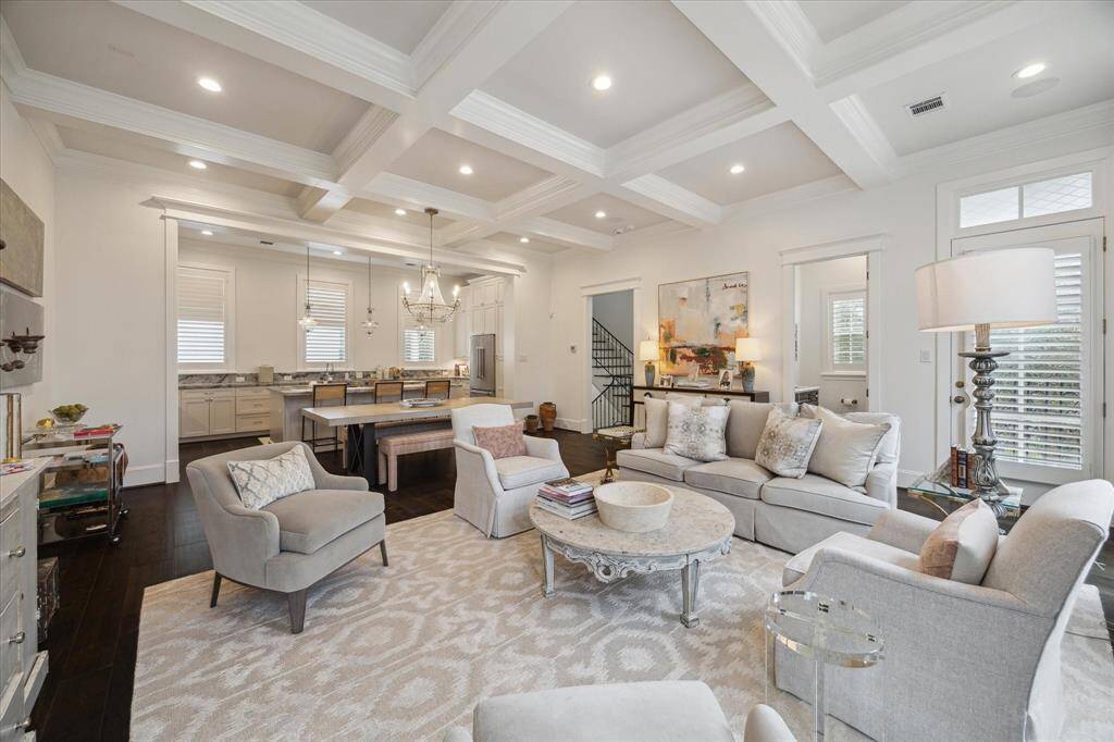 The open concept living, kitchen and dining area is perfect for entertaining. Absolutely stunning.