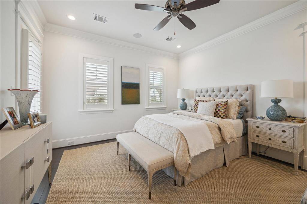 Luxurious primary suite where comfort meets sophistication. This spacious sanctuary boasts two walk-in-closets with a spa-inspired en suite bath.