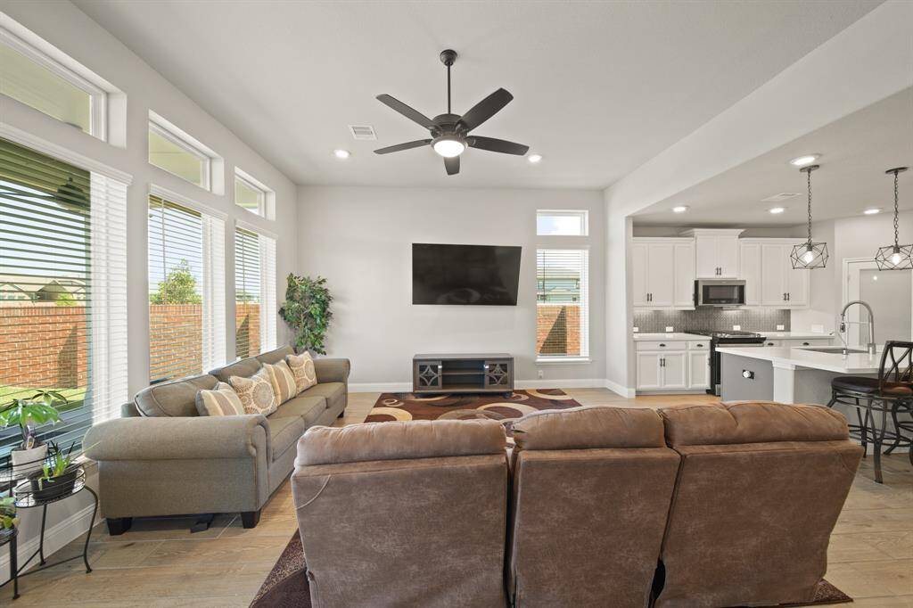 You know it's a good living room when it looks bomb from *every* angle. This one has flow, light, and plenty of wall space for your TV, artwork, or gallery of dog photos. No judgment