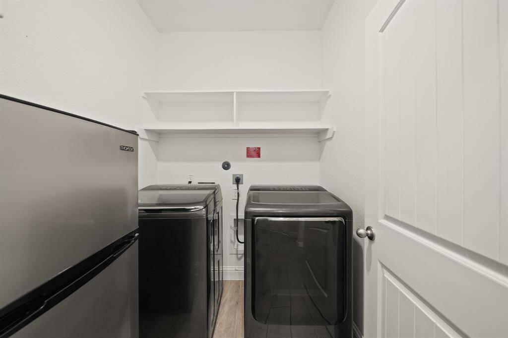 No more dragging baskets across the house. Your laundry zone is bright, efficient, and actually kind of cute? Plus, it's right by the garage, so muddy shoes stay in their lane.