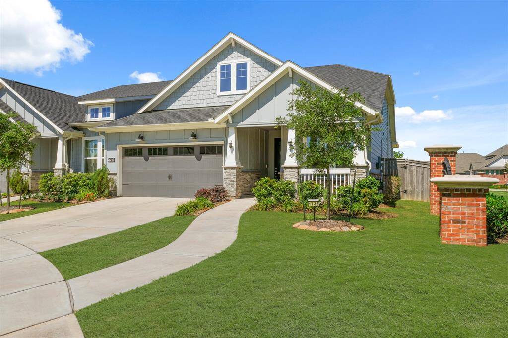 Even your *side* yard is a whole moment. That brick wall? Serving privacy, sophistication, and total “I’ve got space for my grill *and* a garden” vibes. You might even throw your trash out in style.
