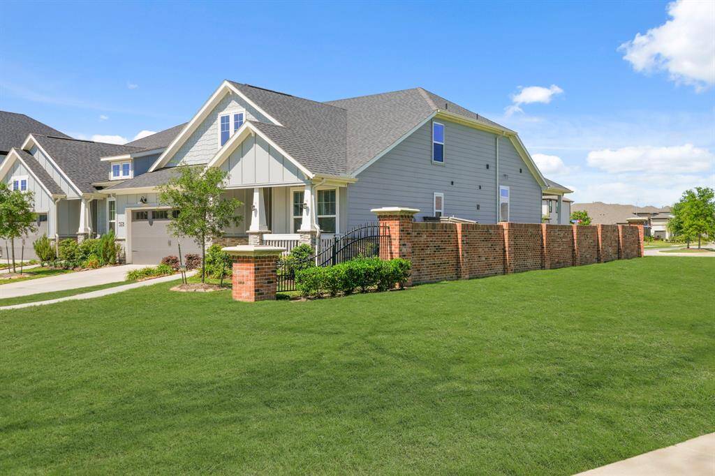 Not only is it private — it’s also extra. That brick fence? It's not just fancy. It’s functional and fabulous. You get a tucked-away vibe with *plenty* of space for whatever makes your outdoor heart happy.