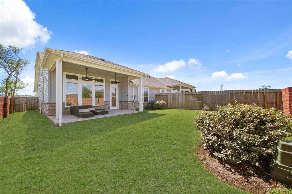 Even the *gate* looks like it belongs in a real estate magazine. That’s how you know this builder didn’t cut corners. You’ve got easy access, serious style, and security to match.