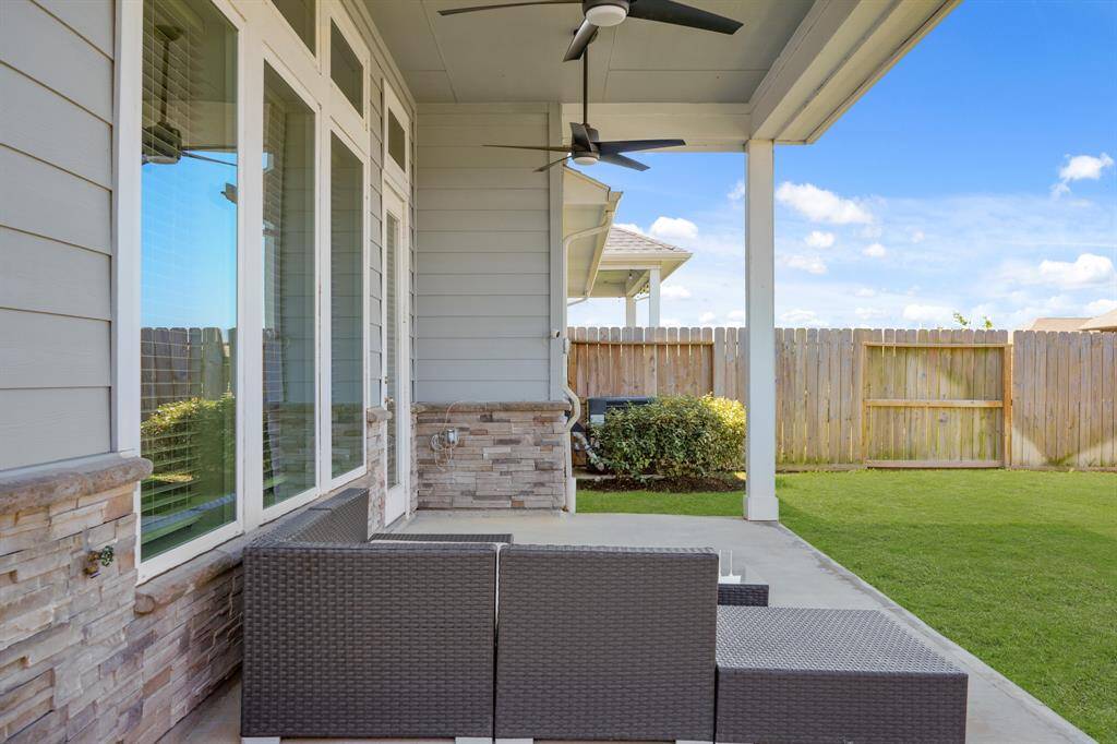 Sometimes you want a little privacy *and* a breeze. This tucked-away patio angle gives you both — and also, it’s still close enough to yell 'dinner’s ready' to anyone in the yard.