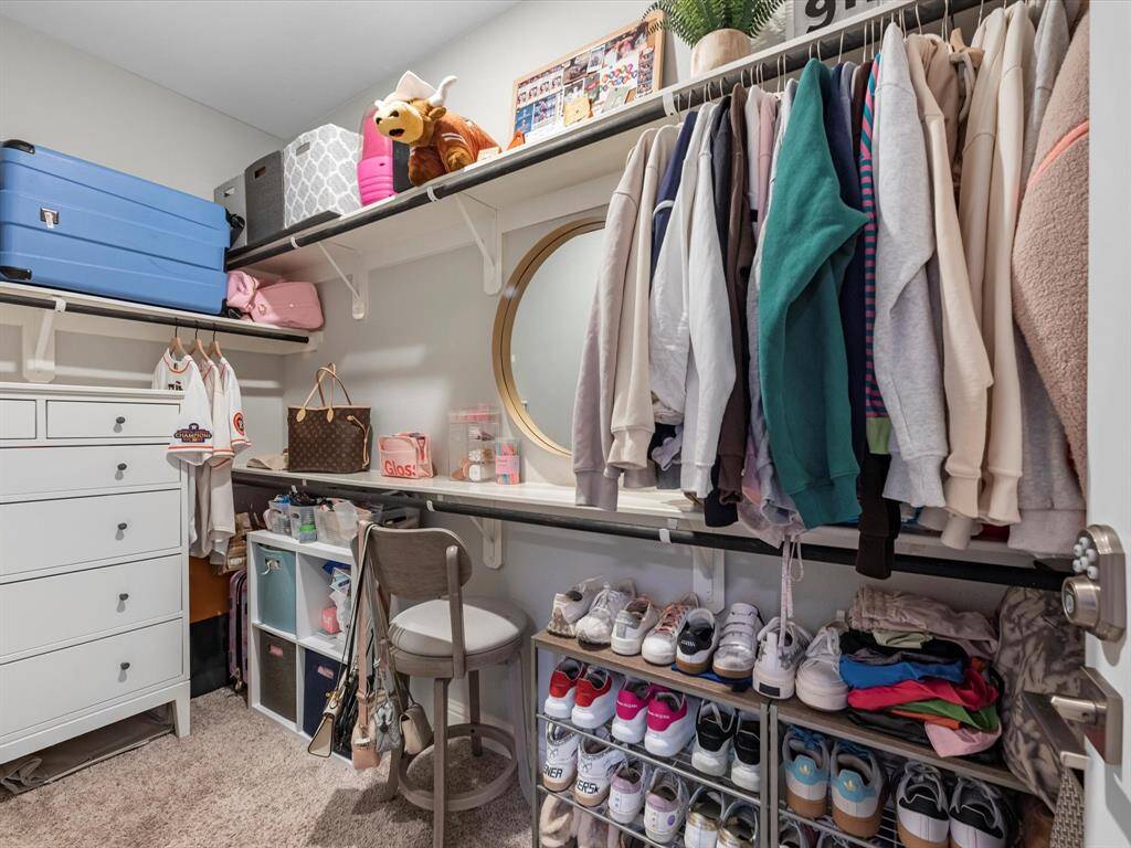 Large walk in closet for 1st floor bedroom.