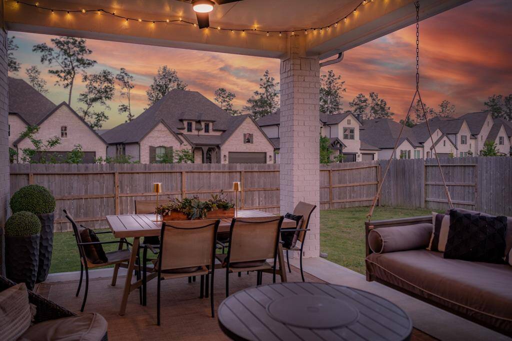 What a patio! Morning coffee? Evening wine? An expansive covered patio overlooks a large backyard, creating the perfect setting for outdoor entertaining and relaxation with room for your grill, dining AND relaxation!