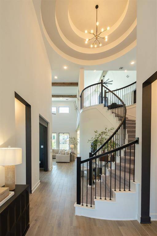 The tray ceiling above the stairs is just the beginning—this home is filled with thoughtfully designed details that elevate every room.