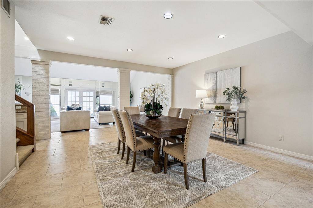 FIRST FLOOR LIVING. Upon entering the home, you'll notice how updated, open plan, light, spacious and airy this entire first floor is.