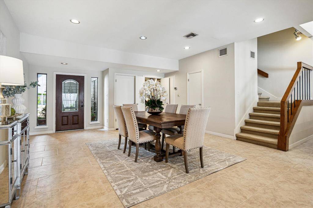 DINING. The dining area is located at the front of the home next to the kitchen. For more casual dining, there is a breakfast area in the kitchen.