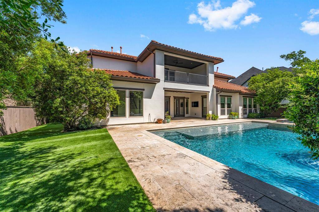Spanish inspired exterior with charming curb appeal.