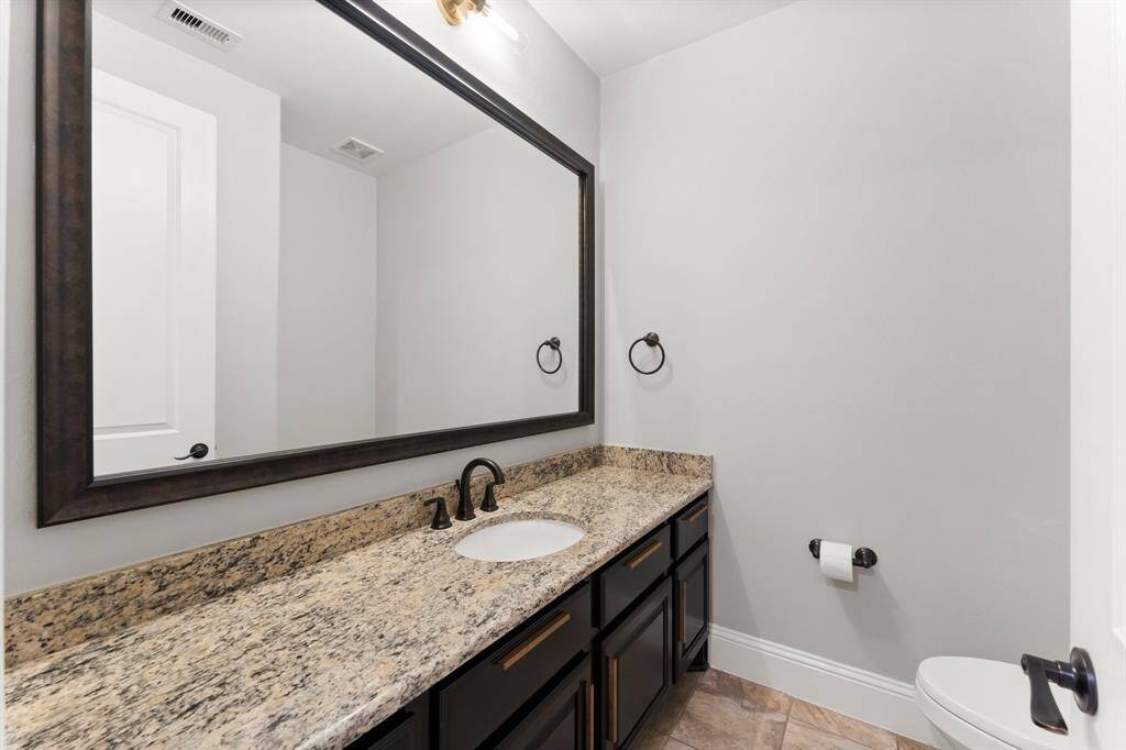 Oversized Half-bath available for guests.