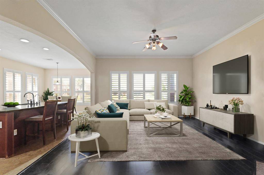 Virtually Staged: Fantastic open layout between the living room and the kitchen.