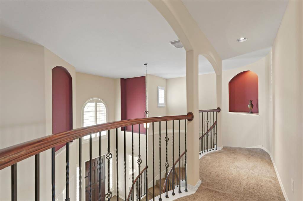 Take a look at your breathtaking entry way from the top of the stair.
