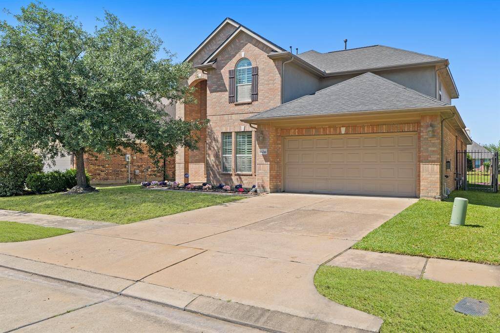 2-car garage with a long driveway.