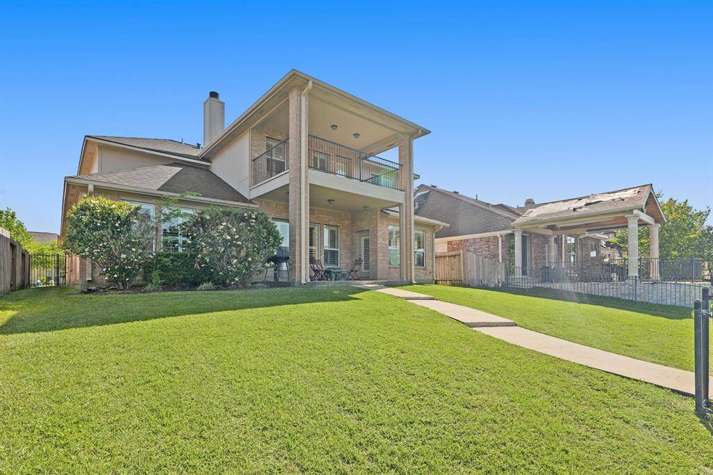 This HUGE backyard is definitely not lacking on green space.