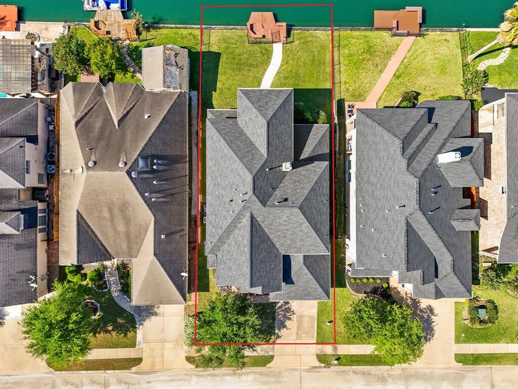 This aerial view showcases the INCREDIBLE 7,150 sqft lot.