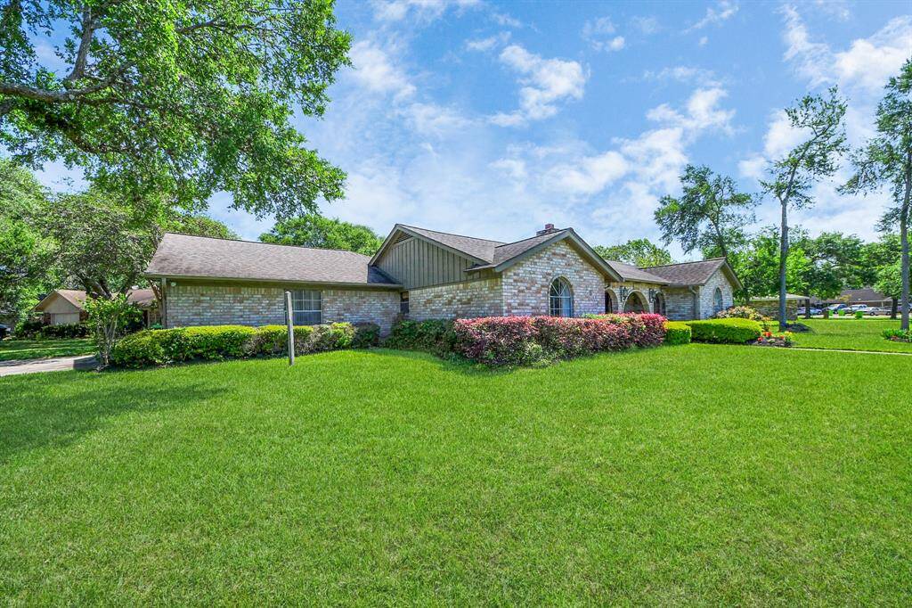 The spacious corner lot offers ample room for front yard play, perfect for outdoor fun and everyday enjoyment.