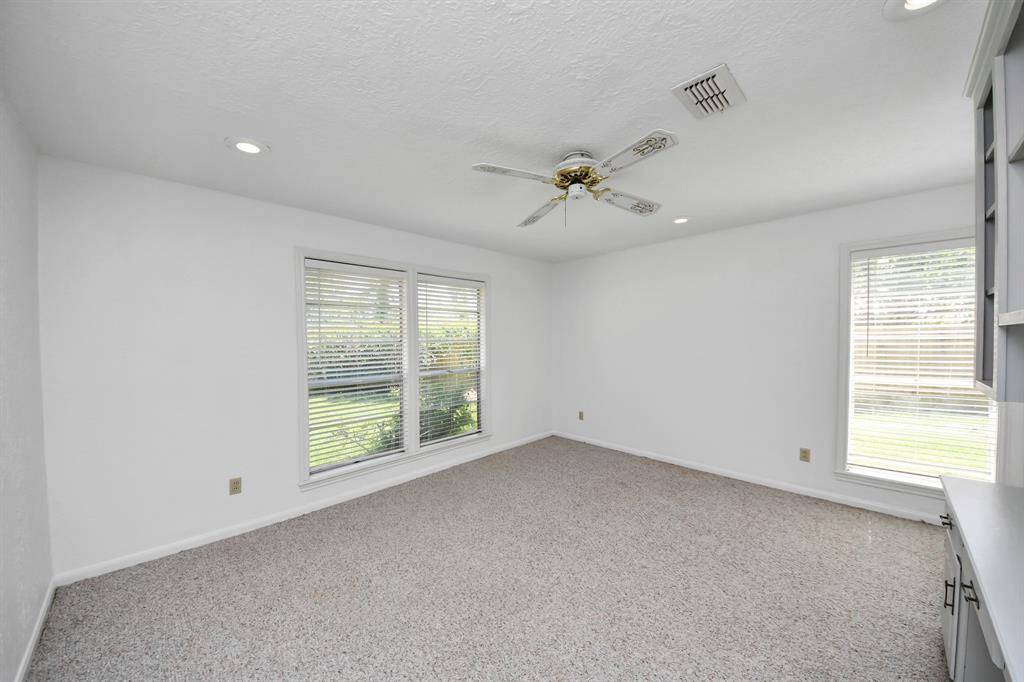 The other secondary bedroom is also spacious, providing plenty of room for personalization and comfort.