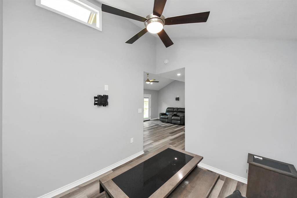 This room is tucked away from the main living area features a thoughtfully placed high window that brings in more natural light.