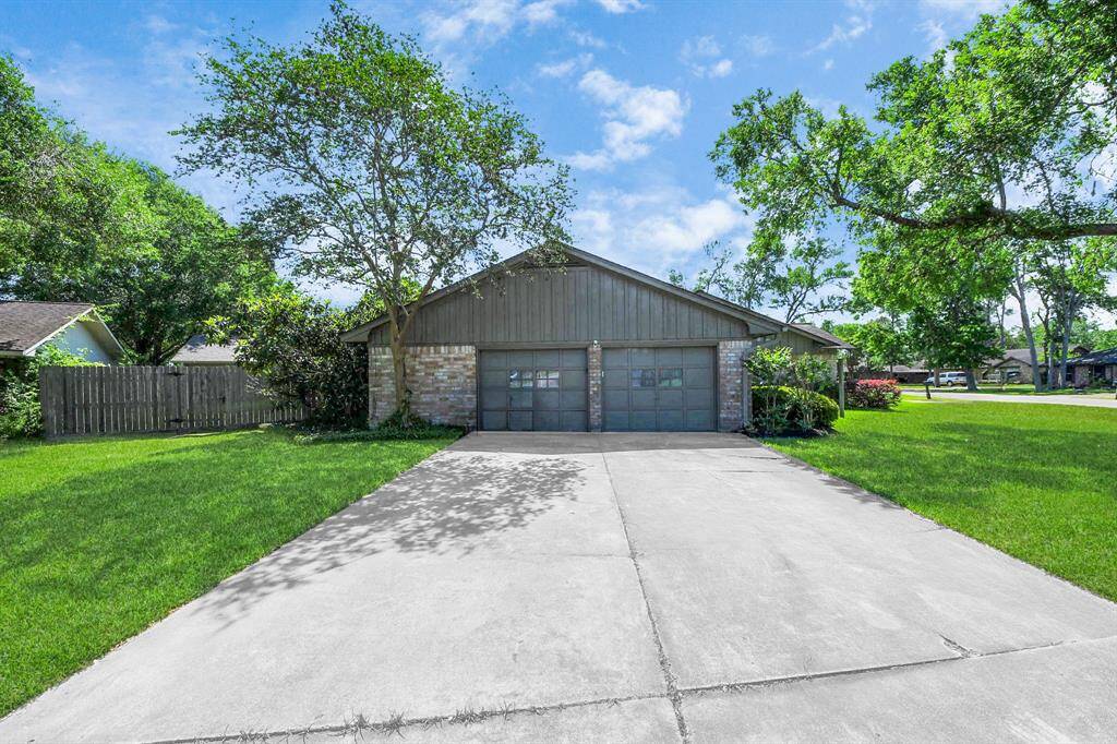 The oversized side-entry two-car garage offers plenty of space, complete with a large storage closet and additional storage options to keep everything organized.