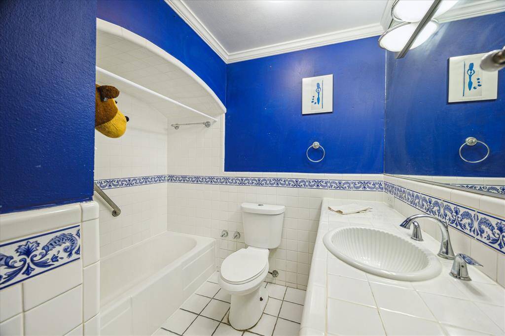 Bath with tub-shower.