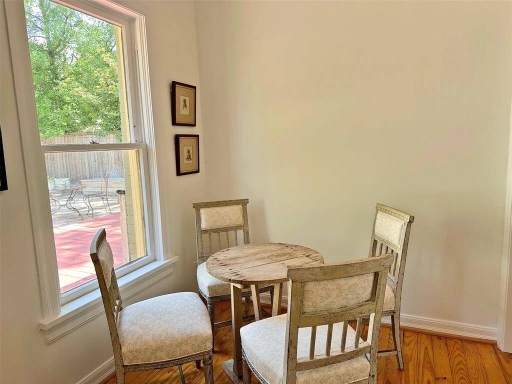 Beautiful hardwood flooring and high ceilings.