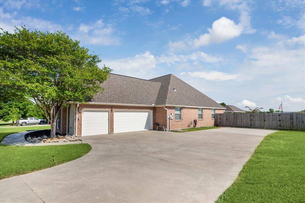 This oversized - three car garage has been freshly repainted on the inside and has fantastic natural lighting, as well.