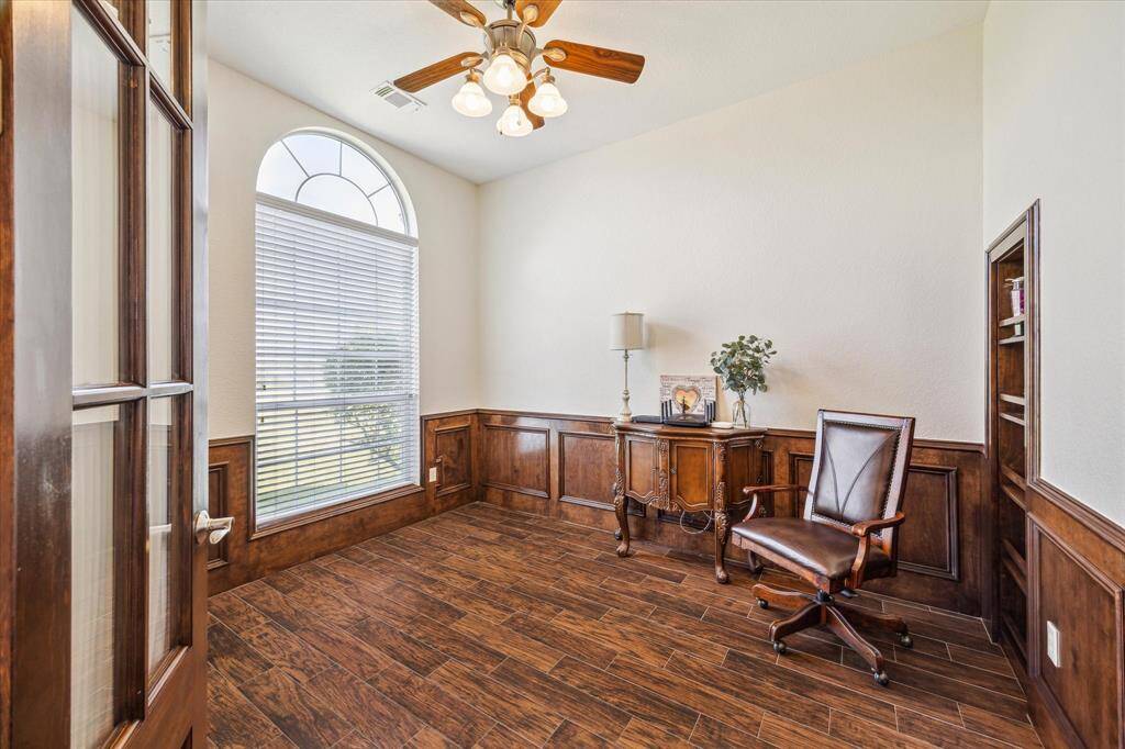 The formal dining room is plenty large enough for a large dining room tabl and , china hutch/buffet.