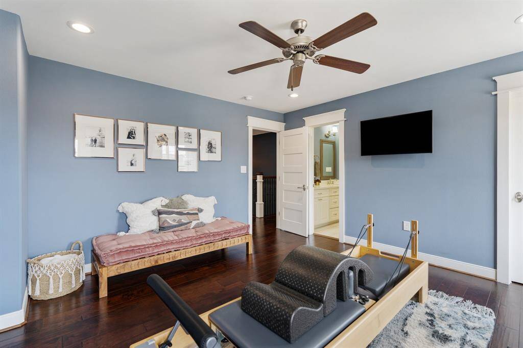 The thoughtful layout of this room allows for flexible use, with direct access to an en-suite bath. Classic architectural details makes it a functional and inviting space.