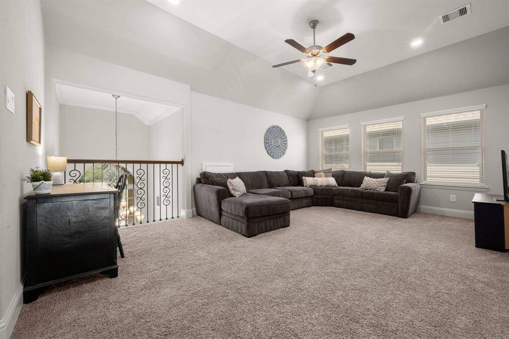 The game room is a perfect spot for a playroom, second living area, or teen lounge.