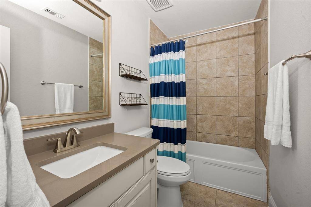 Just off the space is a full-size bathroom for added convenience.