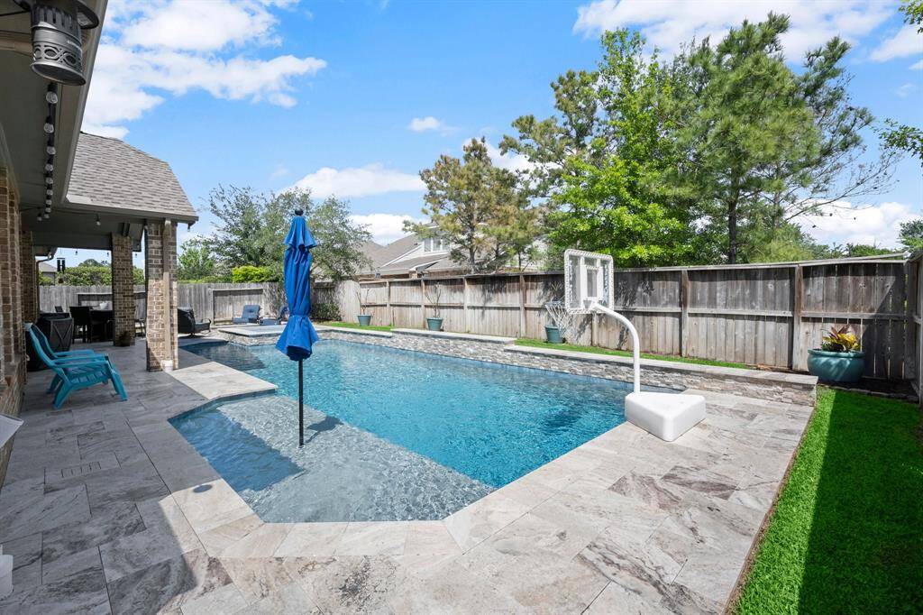 The fully fenced backyard provides privacy and space for outdoor enjoyment.