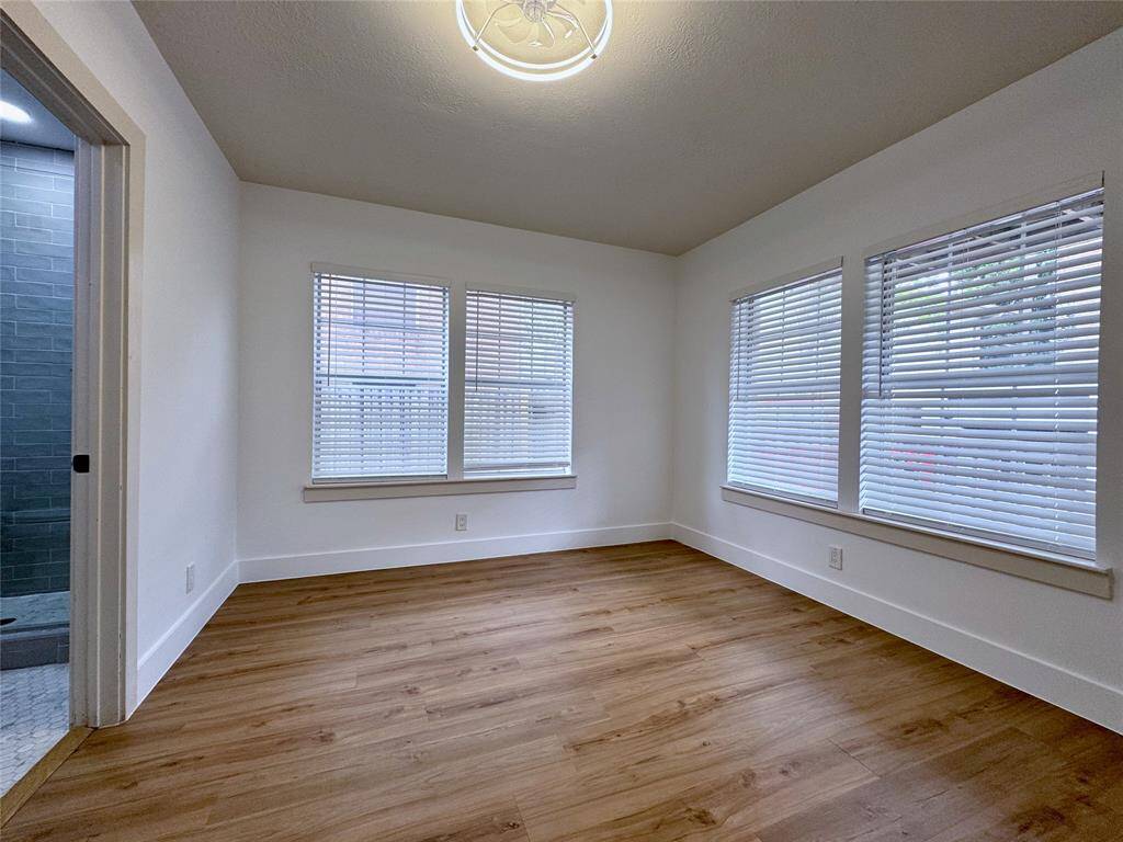 Back bedroom with walk-in shower, fandelier and walk-in closet (not pictured here).