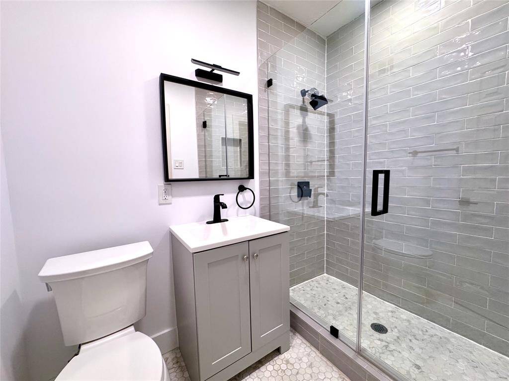 Second en-suite bathroom with walk -in shower.