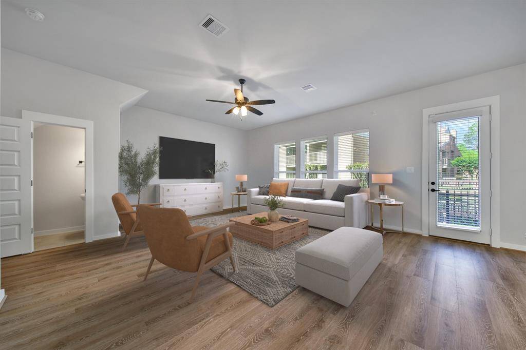 View of living room. Virtually staged.