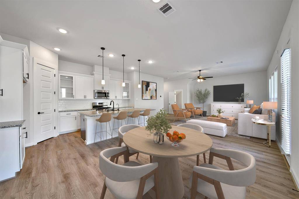View of breakfast nook. Virtually staged.