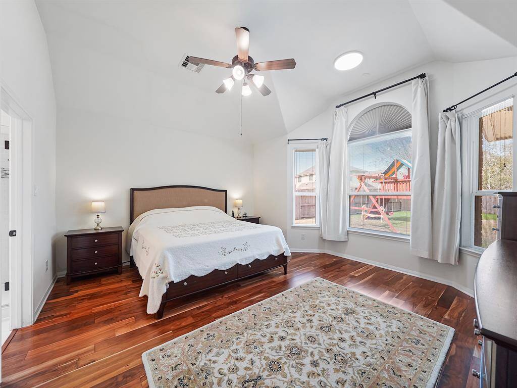 Escape to the spacious primary retreat, complete with bay windows that offer views of the backyard.