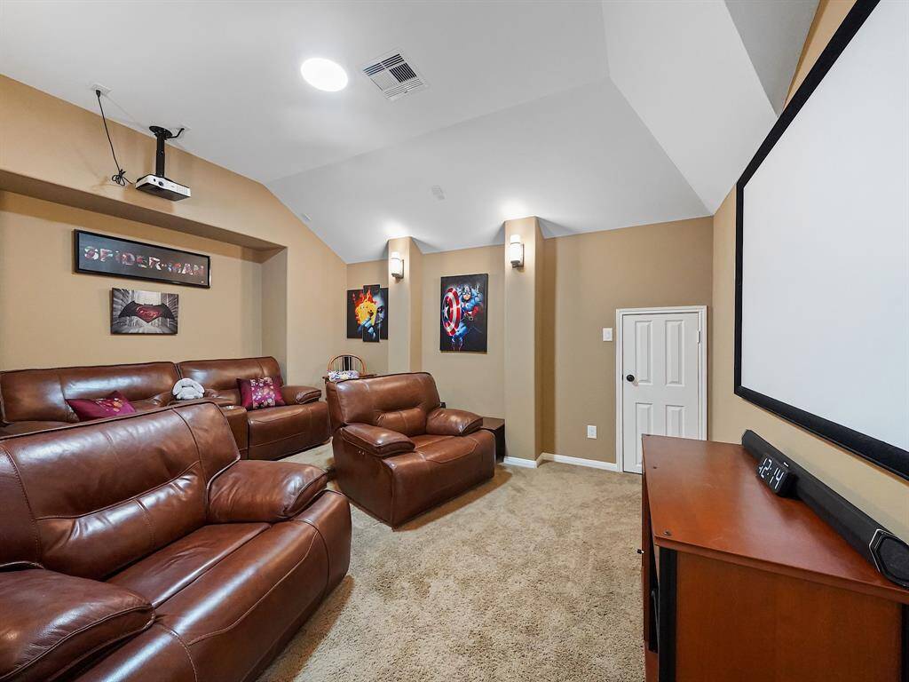 Unwind and entertain in your own private media room! This dedicated space is perfect for movie nights, gaming sessions, or simply relaxing and enjoying your favorite content.