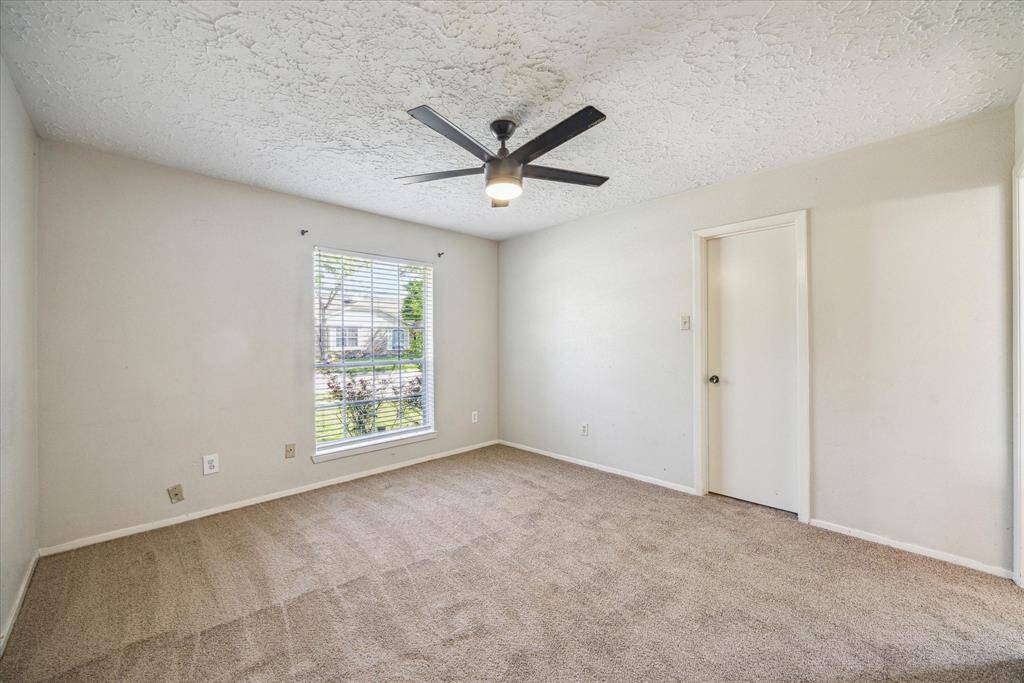 Large Primary bedroom with new carpet