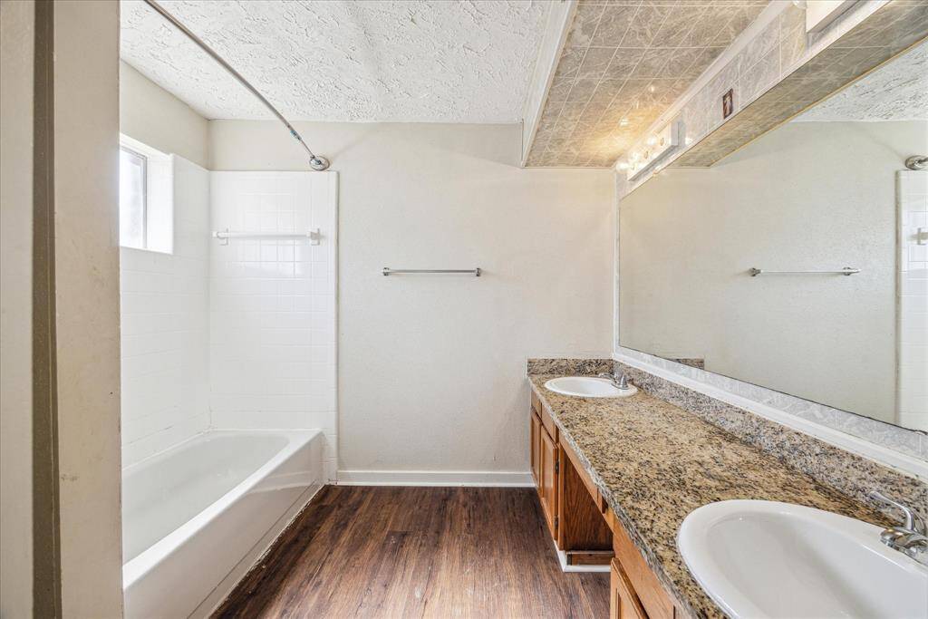 Granite counter tops and double sinks in your primary bathroom!