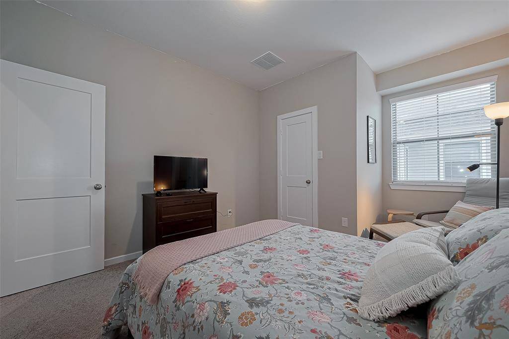 This is the full bath shared by the two secondary bedrooms.  Large vanity and shower/tub combo.