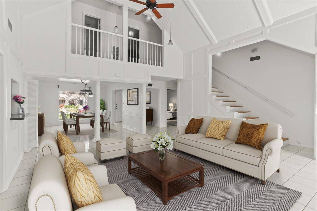 Virtually Staged: It is complete with tile floors, a ceiling fan and pendant lights.